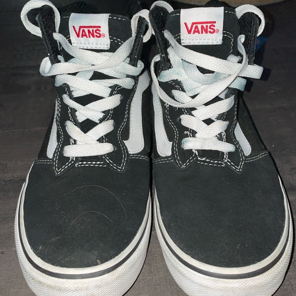 Vans high top.